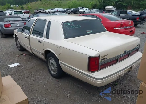 1995 Lincoln Town Car Cartier z USA, uszkodzony, nr VIN 1LNLM83WXSY703833